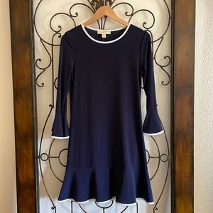 Michael Kors Navy dress with white detail. Brand new with tags. Size small.